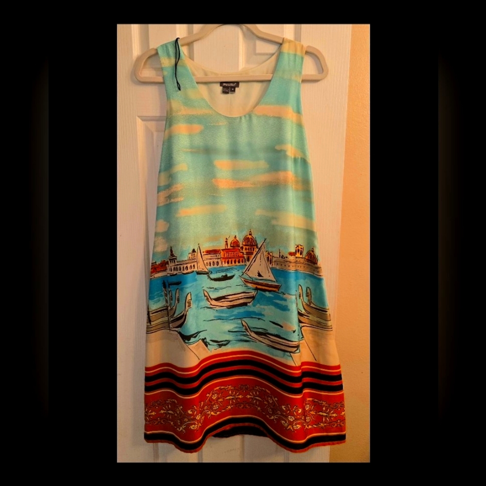 Beautiful dress Size 14 running small like 10/ 12